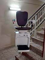 Silla salvaescaleras V59 instalada en una comunidad de vecinos de Barcelona